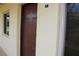 Inviting front door with number 6 on a light beige building, offering a warm entrance at 400 Oakridge Blvd # 6, Daytona Beach, FL 32118