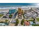 Scenic street view featuring a beautiful condo community with stunning ocean views and direct beach access at 701 N Atlantic Ave # 202, New Smyrna Beach, FL 32169