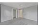 Bright bedroom with gray walls, carpet, and ceiling fan at 798 E 11Th Ave, New Smyrna Beach, FL 32169