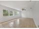 Bright living room with tile floors and ceiling fan at 798 E 11Th Ave, New Smyrna Beach, FL 32169