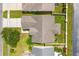 Aerial view of the home showing roof, lawn, and surrounding neighborhood at 1277 Harms Way, Port Orange, FL 32129
