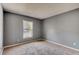Bedroom with neutral carpet and window with natural light at 1277 Harms Way, Port Orange, FL 32129
