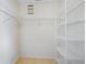 Walk-in closet with wire shelving at 1277 Harms Way, Port Orange, FL 32129