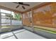 Screened-in porch with blinds and outdoor view at 1277 Harms Way, Port Orange, FL 32129