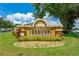 A well-maintained Horizon Community sign with lush landscaping and bright signage at 1277 Harms Way, Port Orange, FL 32129