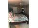 Main bedroom with a double bed, a ceiling fan, and decorative pillows at 155 Breezeway Ct # 155, New Smyrna Beach, FL 32169