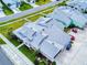 Aerial view showcases the property's manicured landscaping, well-maintained roof, and convenient parking at 452 Lime Ave, Daytona Beach, FL 32124
