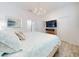 Bright primary bedroom with ensuite bathroom, hardwood floors and walk-in closets at 452 Lime Ave, Daytona Beach, FL 32124