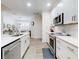 Kitchen featuring a marble counter top island and stainless steel appliances at 452 Lime Ave, Daytona Beach, FL 32124