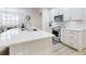 Kitchen featuring a marble counter top island and stainless steel appliances at 452 Lime Ave, Daytona Beach, FL 32124