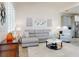Cozy living room with neutral tones, plush seating, modern decor, and abundant natural light at 456 Lime Ave, Daytona Beach, FL 32124