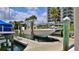 A private boat dock featuring a boat lift, providing convenient water access for residents at 501 N Causeway # 2050, New Smyrna Beach, FL 32169