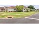 Charming one-story home with lush lawn, mature landscaping, and a two-car garage at 682 Middlebury Loop, New Smyrna Beach, FL 32168