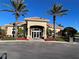 Elegant clubhouse featuring a welcoming entrance, beautiful landscaping, and a well-manicured lawn at 3325 Pintello Ave, New Smyrna Beach, FL 32168