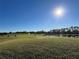 Picturesque golf course with manicured greens and pond at 3325 Pintello Ave, New Smyrna Beach, FL 32168