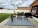 Outdoor patio featuring seating around a coffee table, perfect for relaxing and entertaining at 3325 Pintello Ave, New Smyrna Beach, FL 32168