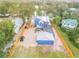 Expansive home featuring a pool, large yard, and multiple parking spaces, creating a private retreat at 532 Faulkner St, New Smyrna Beach, FL 32168