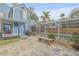 Beautiful backyard featuring a screened-in pool, patio, and pavers, ideal for outdoor relaxation and entertaining at 532 Faulkner St, New Smyrna Beach, FL 32168