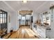 Bright, modern kitchen featuring stainless steel appliances, white cabinetry, and wood countertops and flooring at 532 Faulkner St, New Smyrna Beach, FL 32168