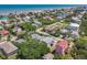 A quaint coastal community offers beach access and charming homes nestled amidst lush greenery near the ocean at 824 Garfish Ave, New Smyrna Beach, FL 32169