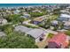 A coastal community offers charming homes near the beach, nestled amidst lush greenery and quiet streets at 824 Garfish Ave, New Smyrna Beach, FL 32169