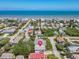 Aerial view of a coastal neighborhood showcasing this property's proximity to the beach at 824 Garfish Ave, New Smyrna Beach, FL 32169