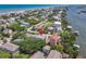 An aerial view of the neighborhood pinpointing this property's location near the ocean and river at 824 Garfish Ave, New Smyrna Beach, FL 32169