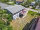 A spacious backyard features a deck perfect for outdoor entertaining and relaxation at 824 Garfish Ave, New Smyrna Beach, FL 32169