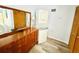 Bedroom with ample built in storage and stacked washer/dryer combination at 824 Garfish Ave, New Smyrna Beach, FL 32169