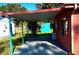 Covered carport with additional storage shed in backyard at 131 W Palm Way, Edgewater, FL 32132