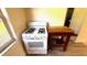 White stove and butcher block kitchen cart at 131 W Palm Way, Edgewater, FL 32132