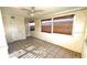 Bright living room with tile flooring and neutral walls at 131 W Palm Way, Edgewater, FL 32132