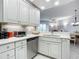 Modern kitchen with stainless steel appliances and ample counter space at 2 Riverwalk Dr # 302, New Smyrna Beach, FL 32169