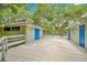 Community deck area offering changing rooms with blue doors and scenic views at 4411 Sea Mist Ct # 275, New Smyrna Beach, FL 32169
