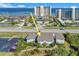 Coastal condo building with lush landscaping offers beach access and community amenities at 4411 Sea Mist Ct # 275, New Smyrna Beach, FL 32169