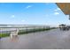 Expansive beachfront balcony with ocean views and outdoor seating, perfect for relaxation at 4621 S Atlantic Ave # 7101, Ponce Inlet, FL 32127