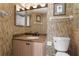 Well-maintained bathroom features granite counters and shower enclosure at 4621 S Atlantic Ave # 7101, Ponce Inlet, FL 32127
