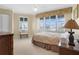 Inviting bedroom with plantation shutters allowing for a naturally bright space at 4621 S Atlantic Ave # 7101, Ponce Inlet, FL 32127