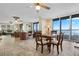 Bright dining area with ocean views and seating for four at 4621 S Atlantic Ave # 7101, Ponce Inlet, FL 32127