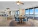 Bright dining area with ocean views and seating for four at 4621 S Atlantic Ave # 7101, Ponce Inlet, FL 32127