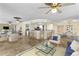 Spacious living room with bar, dining area, and comfortable seating at 4621 S Atlantic Ave # 7101, Ponce Inlet, FL 32127