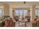 Cozy living room with comfortable seating and ocean view balcony at 4621 S Atlantic Ave # 7101, Ponce Inlet, FL 32127