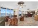 Spacious living room features ocean views, ceiling fan, and comfortable seating arrangement at 4621 S Atlantic Ave # 7101, Ponce Inlet, FL 32127
