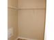 Empty walk-in closet with wire shelving and neutral walls ready for organizing your wardrobe at 537 Coral Trace Blvd, Edgewater, FL 32132