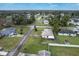 Wide aerial view of the house and neighborhood at 1331 Umbrella Tree Dr, Edgewater, FL 32132