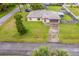 Aerial view showing house, yard, and driveway at 1331 Umbrella Tree Dr, Edgewater, FL 32132