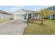 Charming single-Gathering home with a manicured lawn and a brick driveway, located in a desirable community at 270 Eagle Harbor Way, Daytona Beach, FL 32124