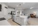 Bright kitchen featuring a large island, stainless steel appliances, and an open concept layout at 270 Eagle Harbor Way, Daytona Beach, FL 32124