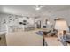 Open concept living room featuring a large island, modern appliances, and an adjacent dining area at 270 Eagle Harbor Way, Daytona Beach, FL 32124