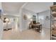 Open-concept space featuring a home office with a wooden desk and shelving, seamlessly connected to living areas at 270 Eagle Harbor Way, Daytona Beach, FL 32124